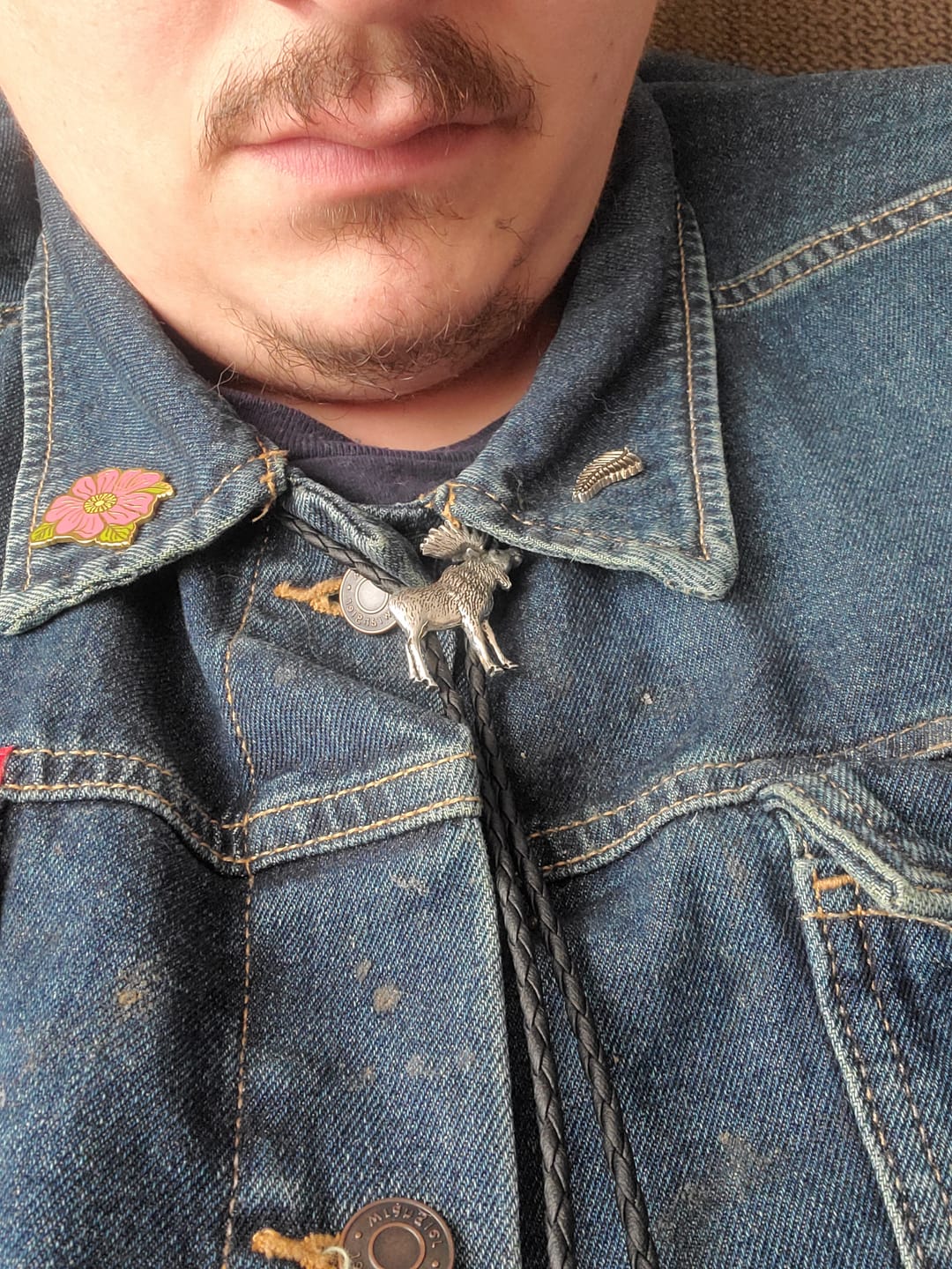 Customer photo review of Silver Fern Pinback Badge