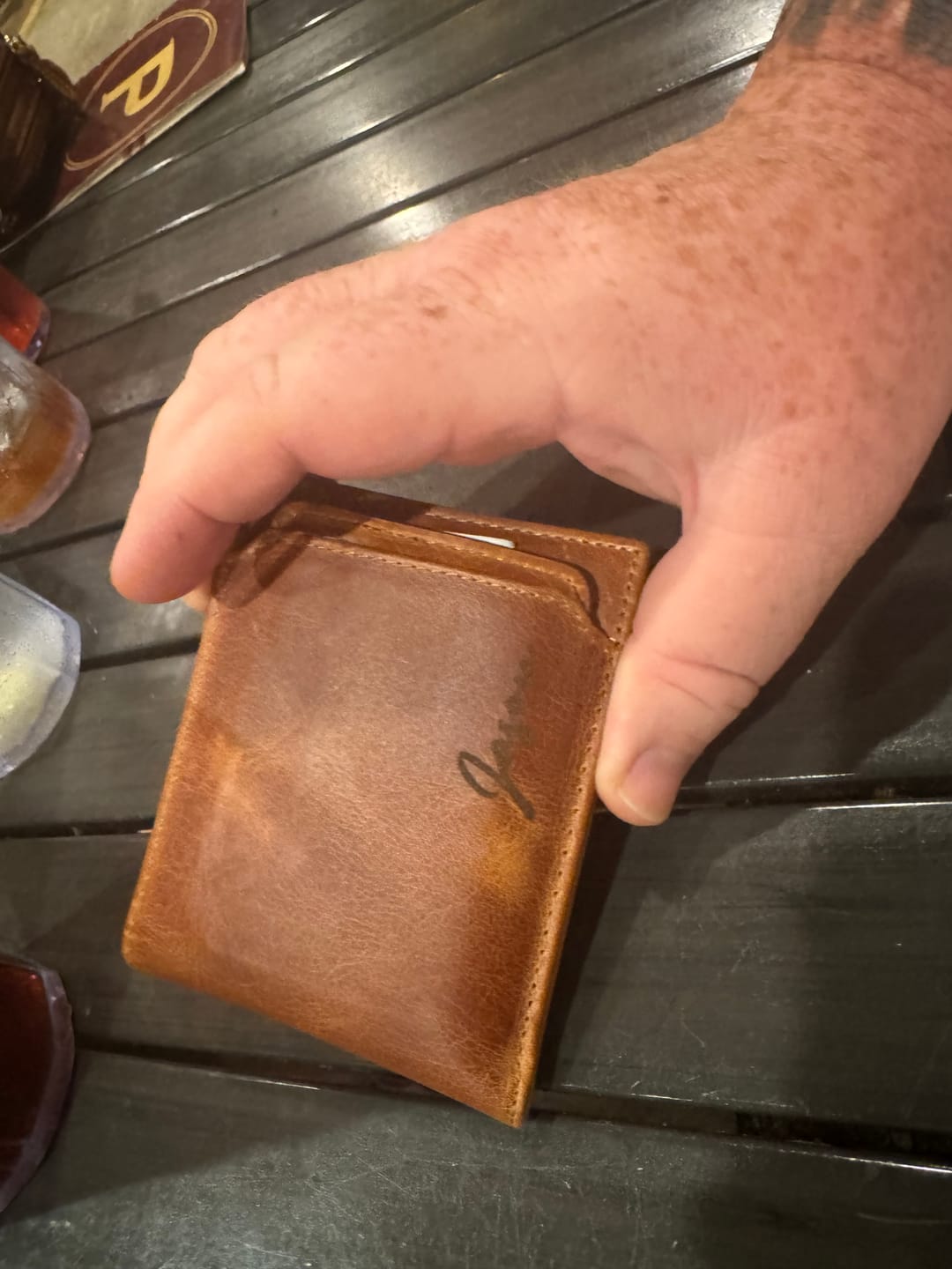 Customer photo review of Personalized Handcrafted Leather Bifold Wallet for Men