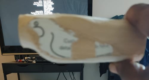 Reviewer's close-up of the blurry woodcarving bird project from the Craft DIY Subscription Box.
