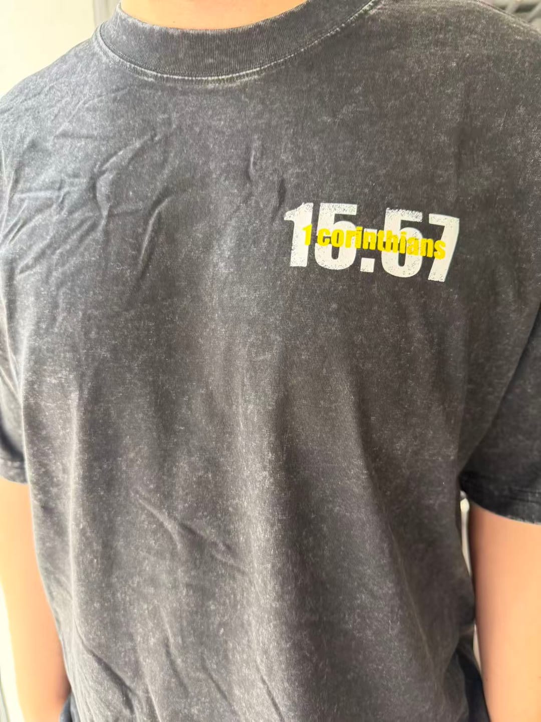 Customer photo review of Jesus Always Wins Football Graphic Tee