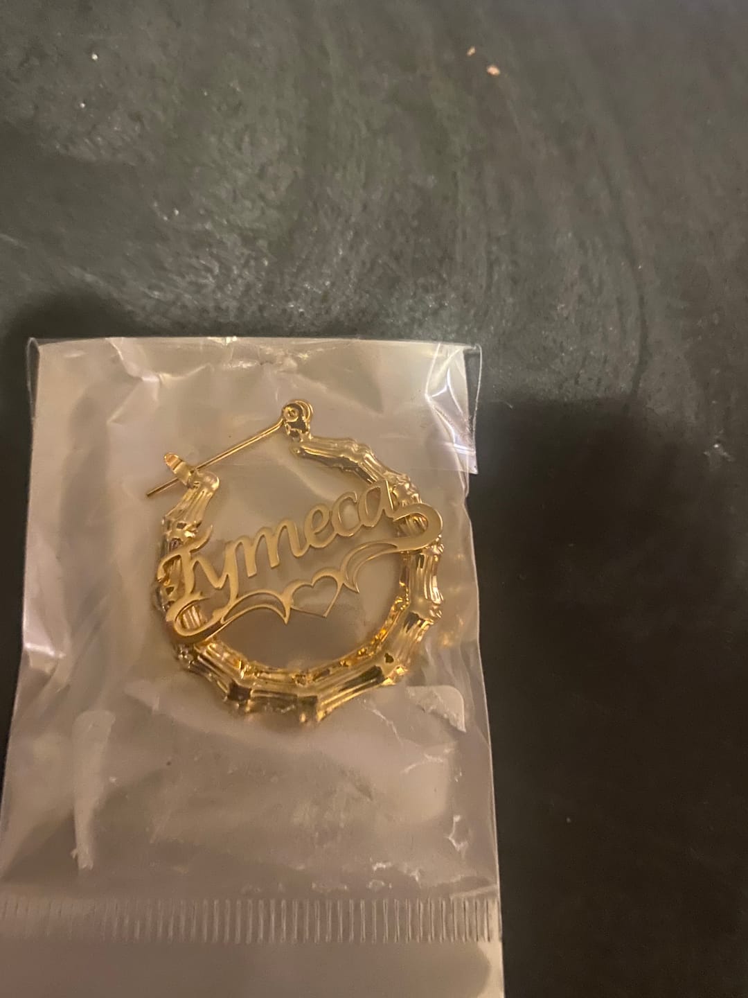 Customer photo review of Personalized Unique Hoop Name Earring with Heart