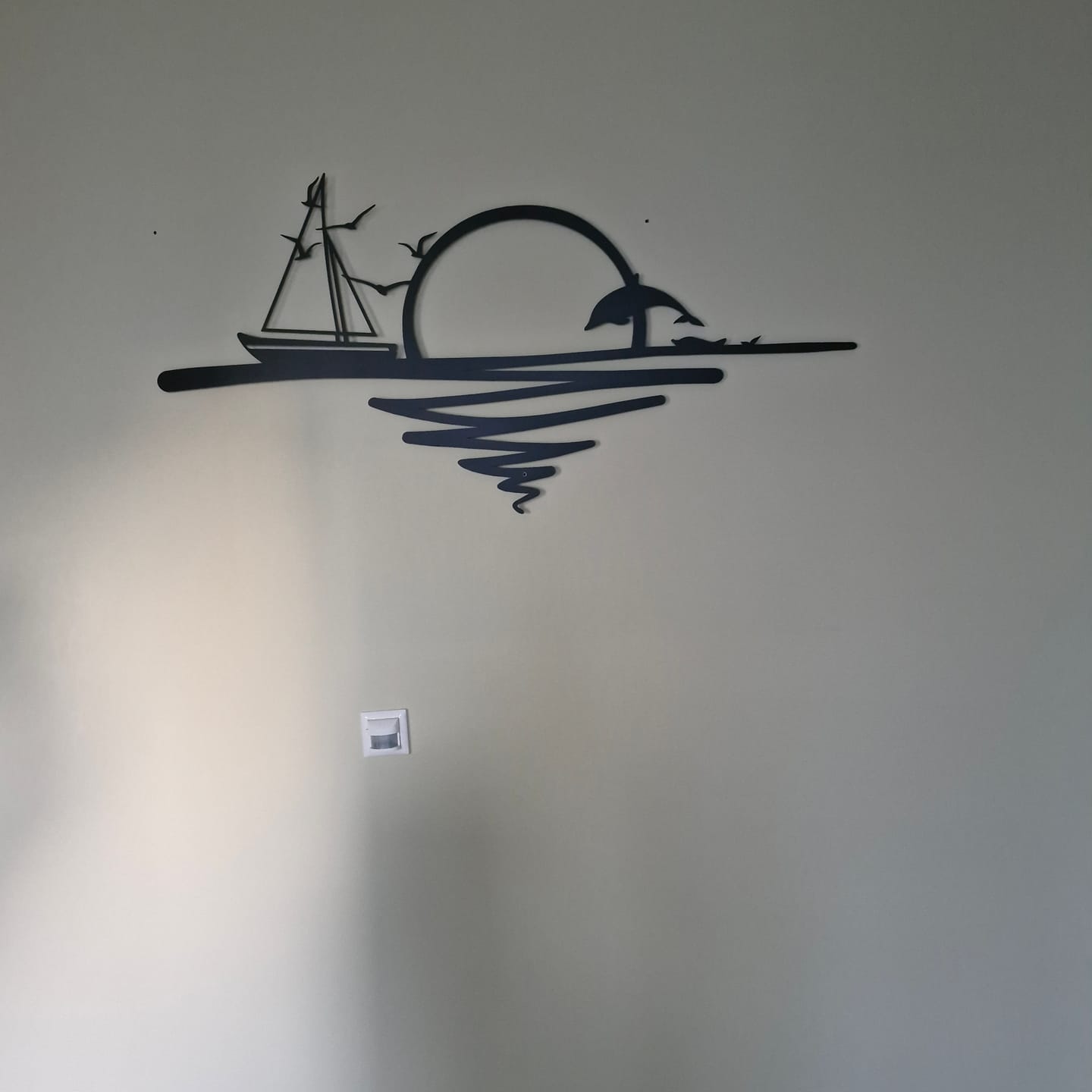 Customer photo review of Décoration murale en métal - Lever du soleil (SUN.02)