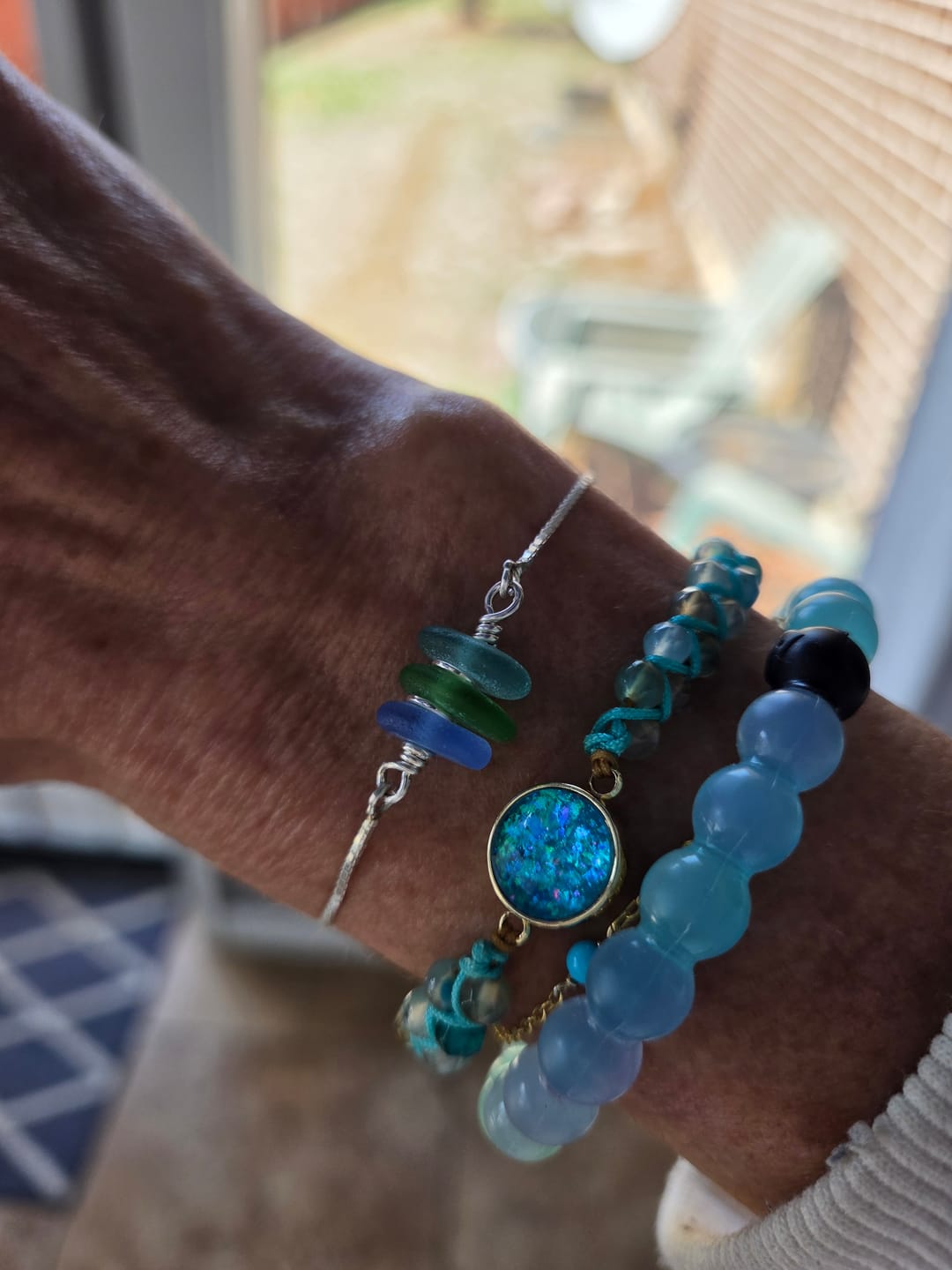 Customer photo review of Aqua Pura Opal Protection Bracelet