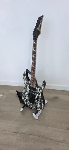 Customer photo review of BunnyNest A-Frame Guitar Stand – Collapsible, Lightweight, Portable, & Universal for Acoustic, Electric, and Bass Guitars