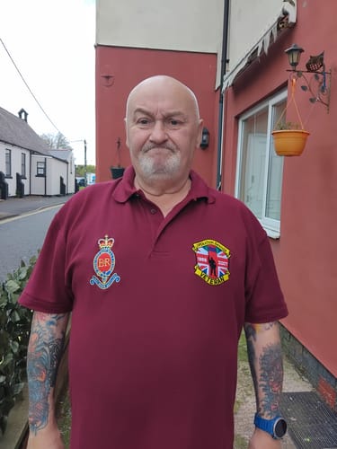 Customer photo review of Operation Banner Polo Shirt