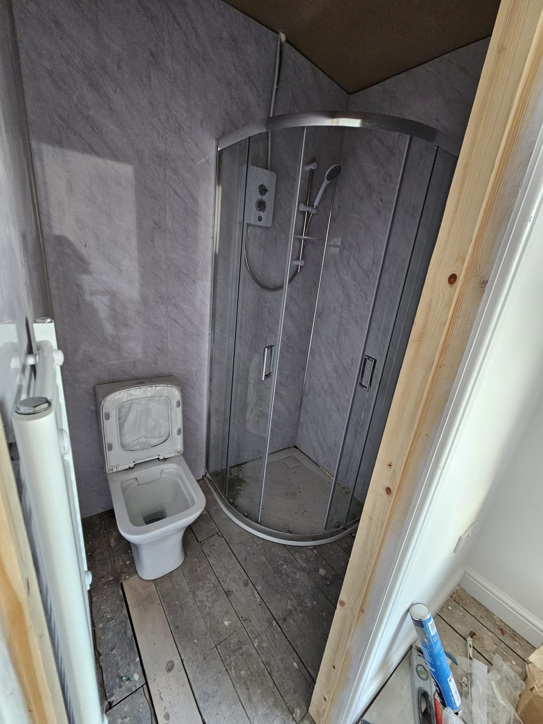 Customer photo review of Premium Grey Marble Gloss Shower Wall Panel – 1M x 2.4M