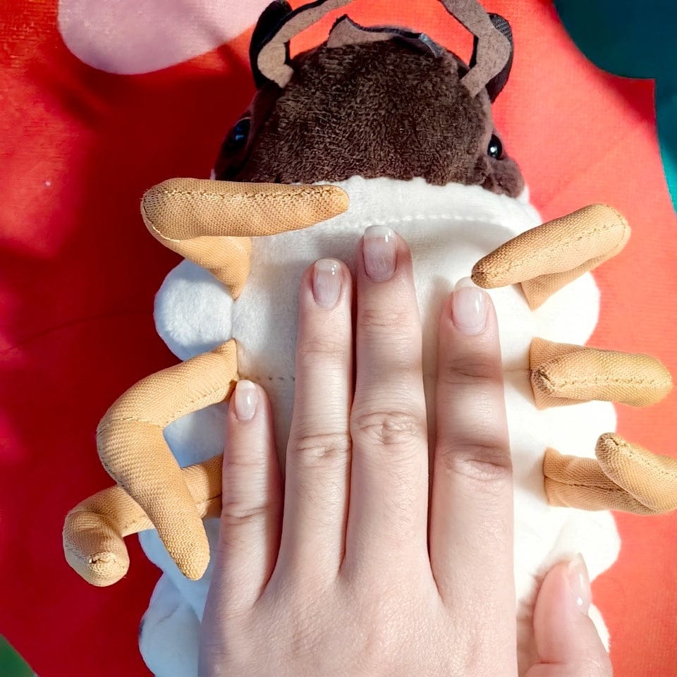 Customer photo review of White Grub Plush Toy – Realistic, Soft, and Perfect for Bug Lovers