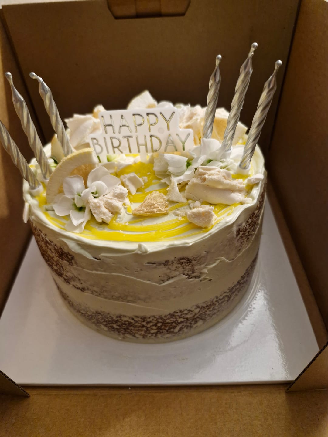 Customer photo review of lemon meringue cake