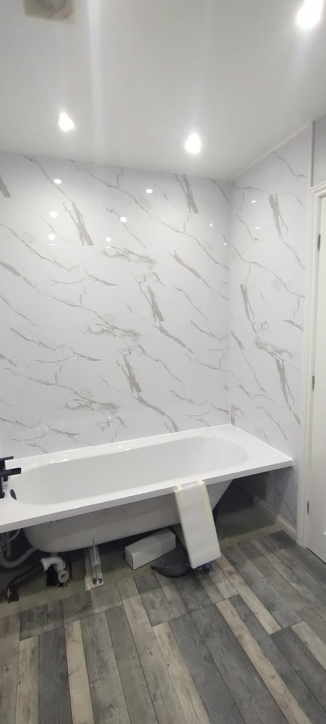 Customer photo review of 4 Pack | 8mm Carrara White Marble Gloss Wall & Ceiling Panel 2.6m