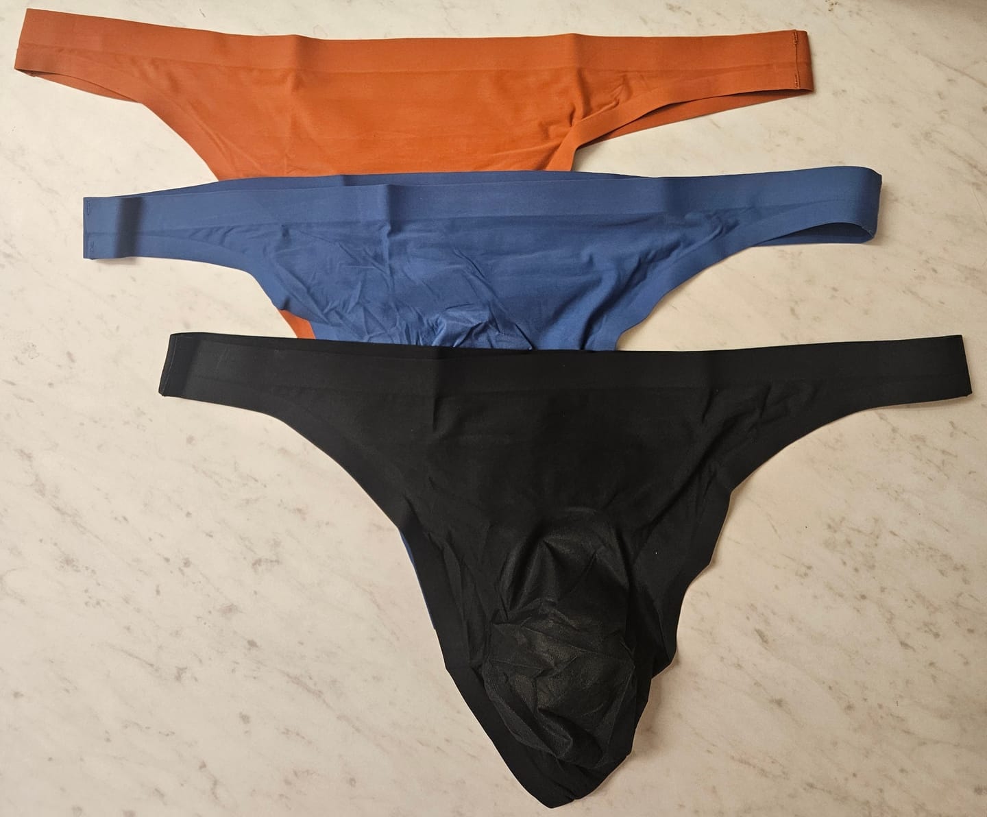 Customer photo review of Brushed Nylon Seamless 0in Thongs No Fly 3pk Black/Nightfall/Red Stone