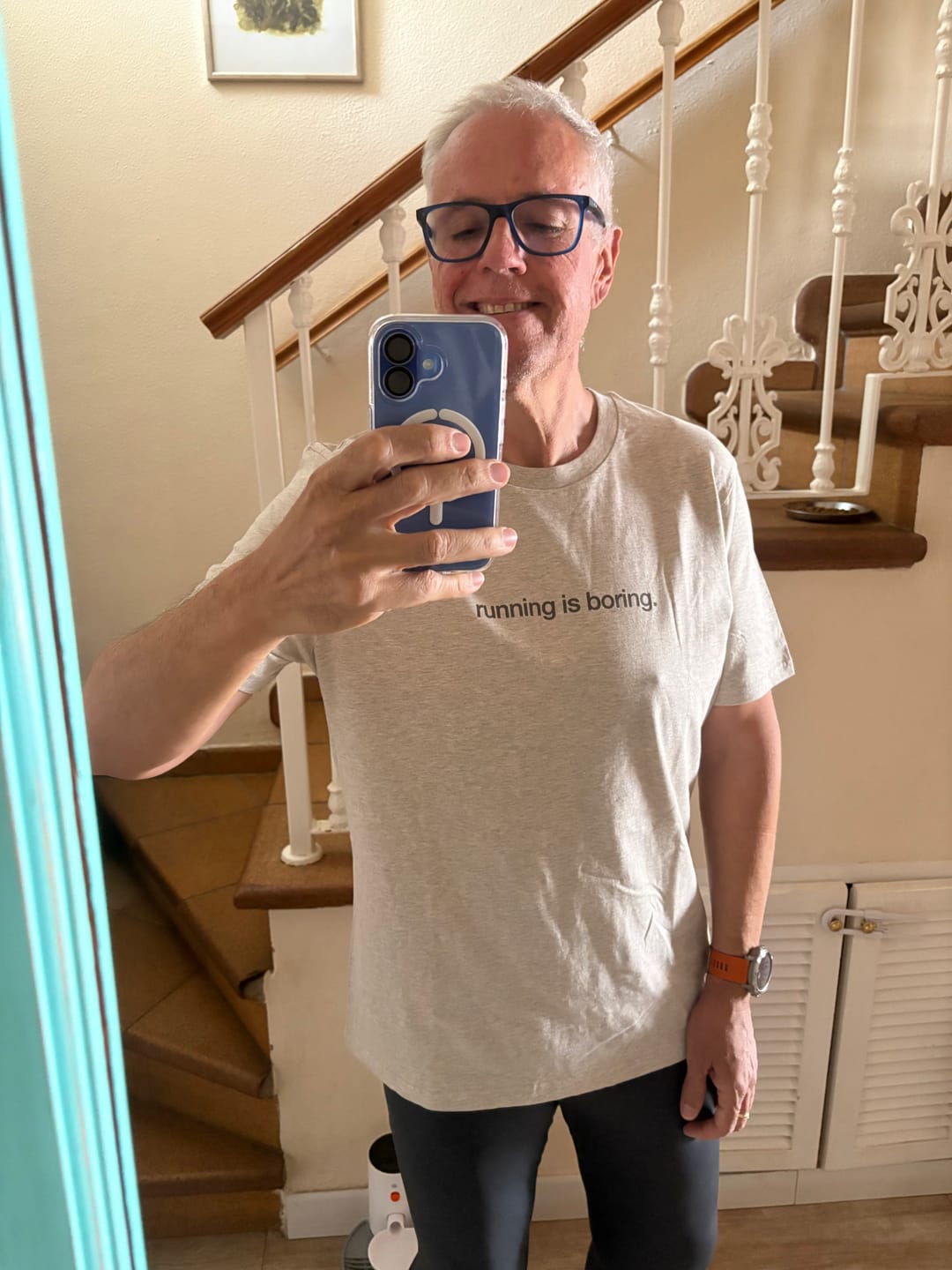Customer photo review of tee, running is boring, almost beige.