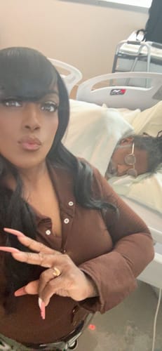 Reviewer taking a selfie, showing off their long, dark Chade New Born Free Cutie Collection Full Wig with bangs.