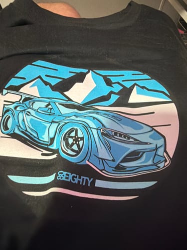 Customer's black 80Eighty Summit Speed Shirt, showing the front graphic of a blue sports car and mountains.