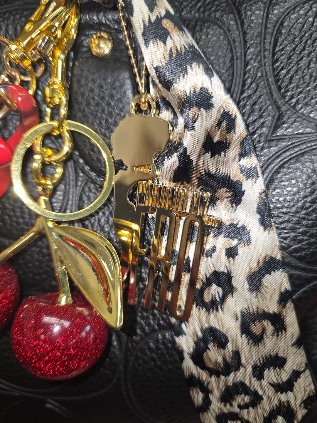Customer photo review of Pardon My Fro Gold Logo Bag Charm