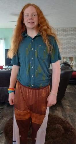 Customer wearing the SLS - Pajama Pants, showing the full-length rocket-themed print.