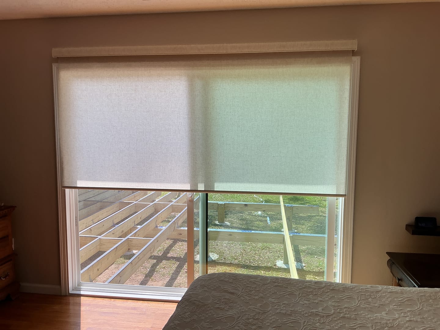 Customer photo review of SmartWings Motorized Light Filtering Roller Shades 70% Blackout Linen
