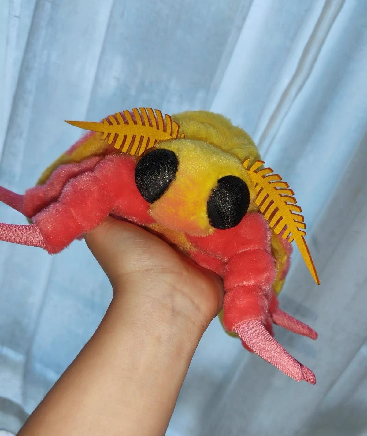 Customer photo review of Realistic Rosy Maple Moth Plush – Soft, Lifelike, and Perfect for Nature Lovers