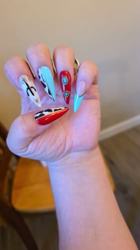 Customer photo review of Gotti No Wipe Gel Top Coat - Super Slick - New and Improved Formula (GOLD BOTTLE)