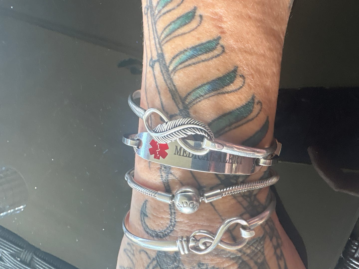 Customer photo review of Personalised Silver Medical Alert ID Bangle Bracelet