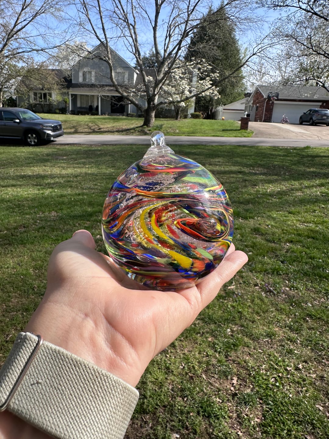 Customer photo review of Rainbow Confetti Orb with Cremation Ashes
