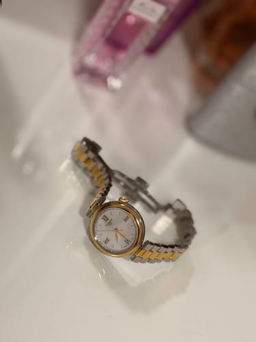 Customer photo review of Tissot Women's Stainless Steel & Yellow IP Quartz Watch T152.010.22.118.01