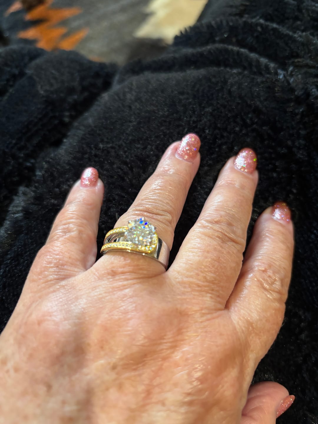 Customer photo review of Buckle Round Cut Moissanite Two Tone Engagement Ring