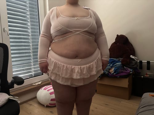 Customer wearing the full pink Ballerina Bliss 3 Piece Set indoors.
