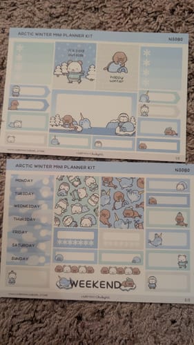 Customer's Arctic Winter Mini Planner Kit, showing the two sticker sheets with cute arctic animal designs.