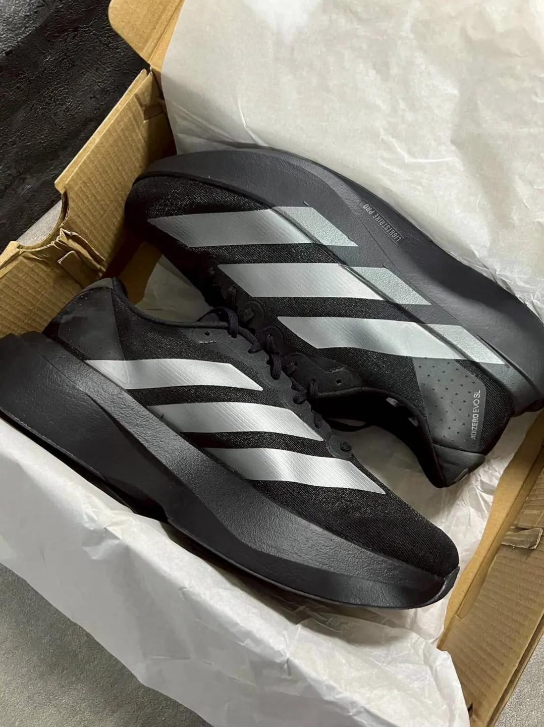 Customer photo review of Adizero Evo SL CoreBlack / Iron Mettalic