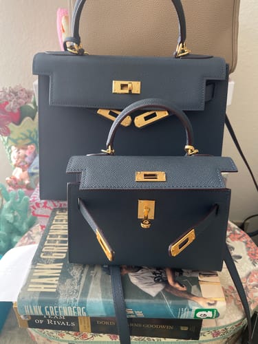 Customer's small and large navy Kally Leather Bags shown together for a size comparison.