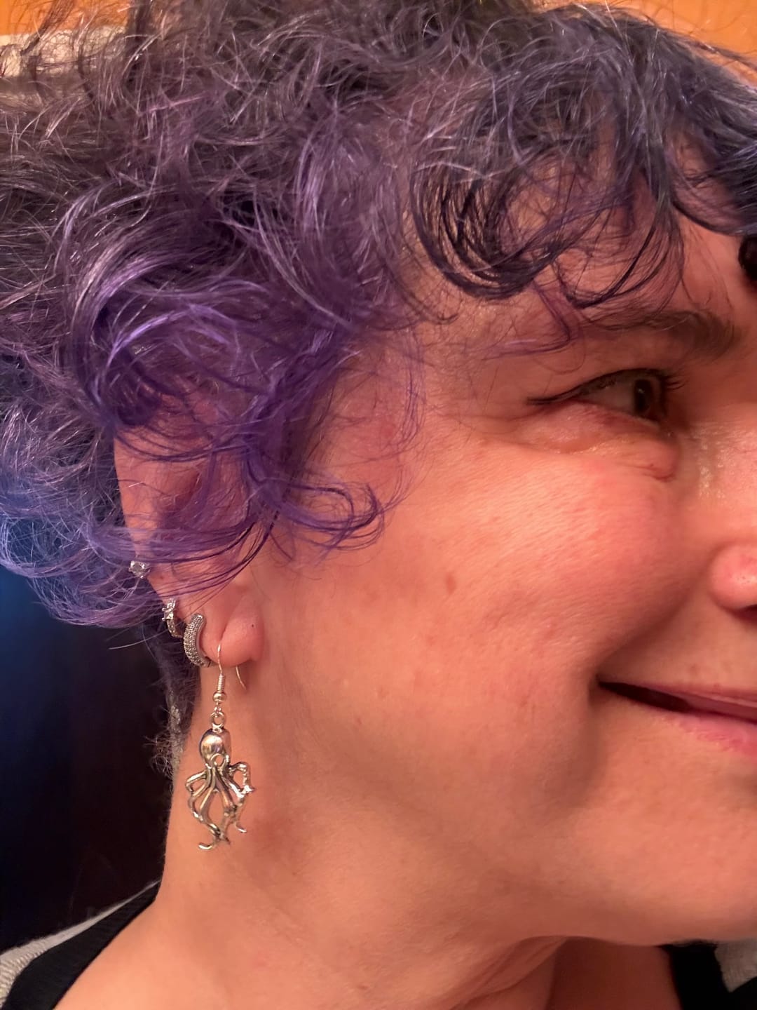 Customer photo review of Octopus Earrings to Symbolize Adaptability