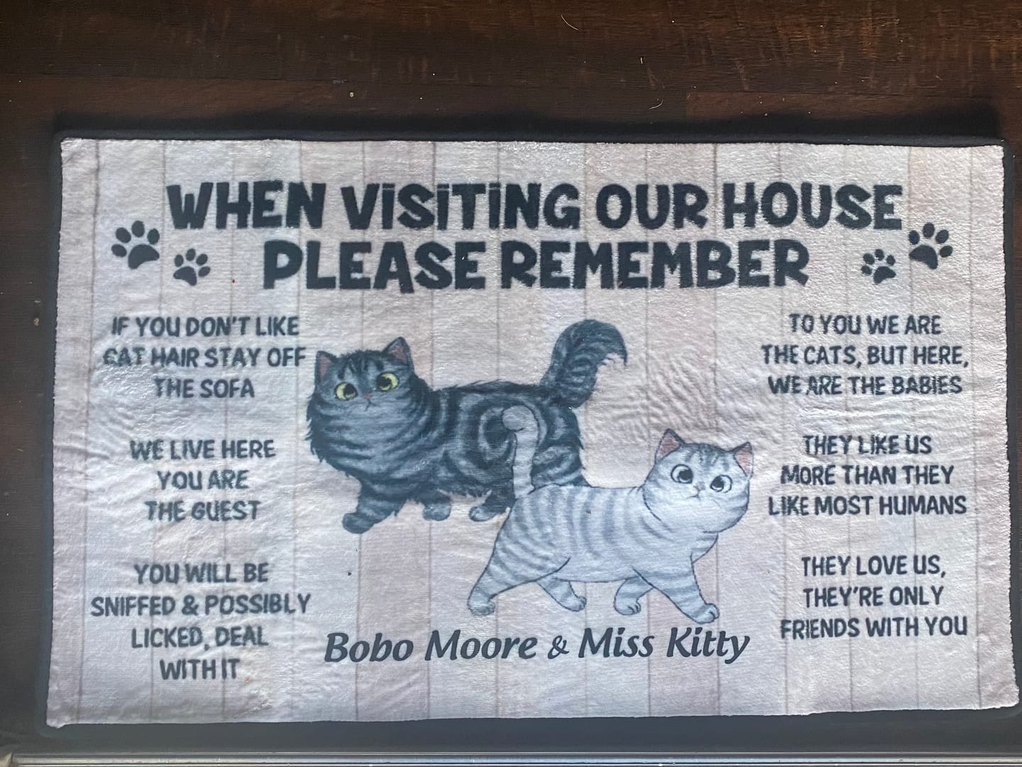 Customer photo review of Please Remember When Visiting Cats House Personalized Doormat