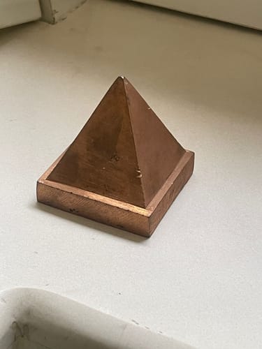 Customer photo review of Solid Copper Pyramid Vastu Remedy for Health, Wealth and Positive Energy Balance for Home Entrance, Main Door and Kitchen Placement | 7.6 cm | 850 g