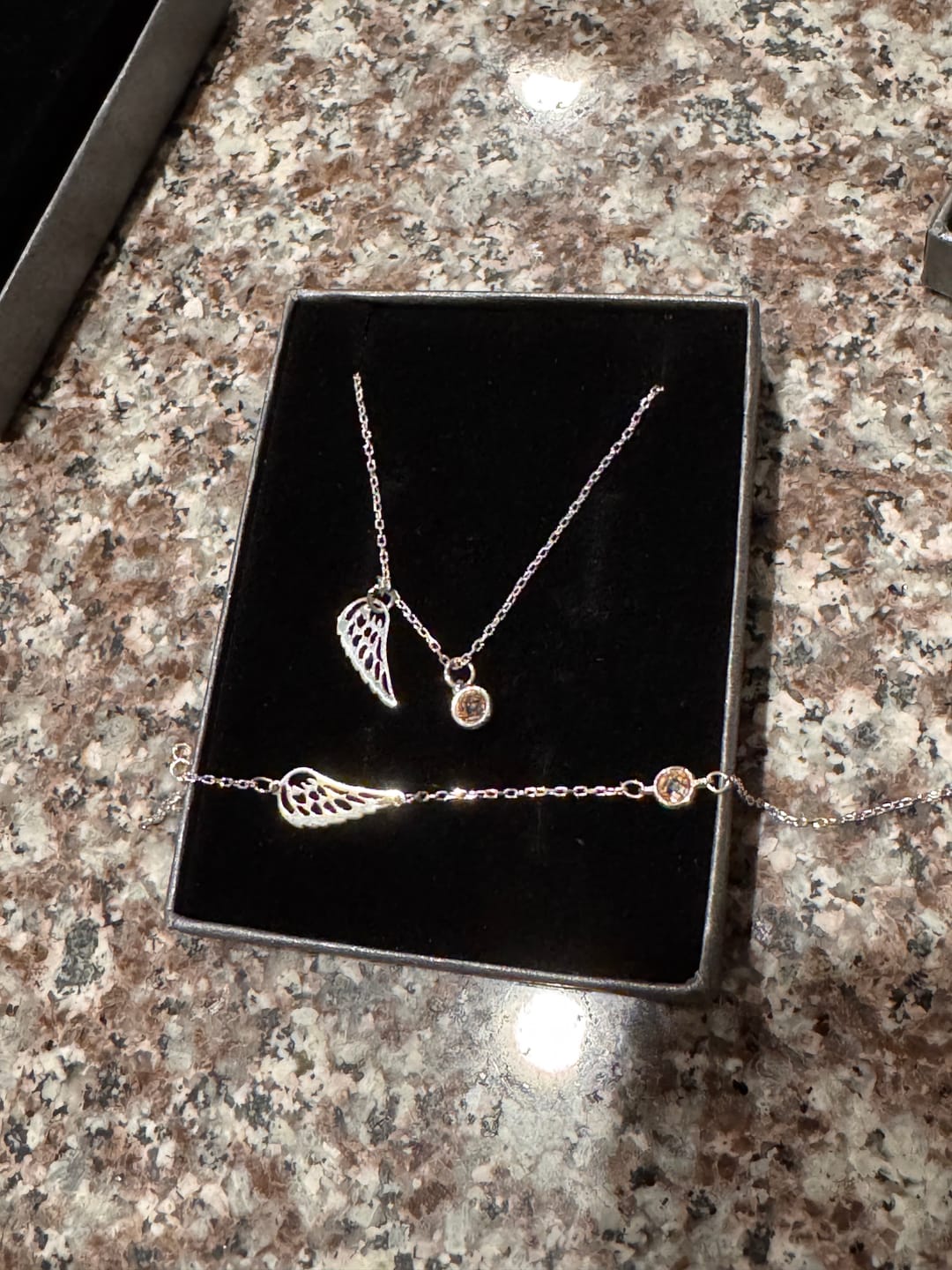 Customer photo review of Angel Wing Birthstone Necklace