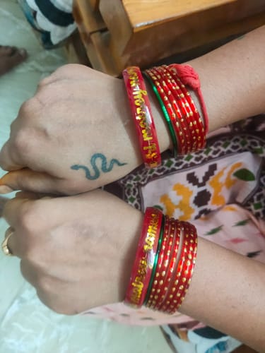 Customer photo review of Anmol Bandhan Gold Bangles –  Love & Togetherness crafted in Gold