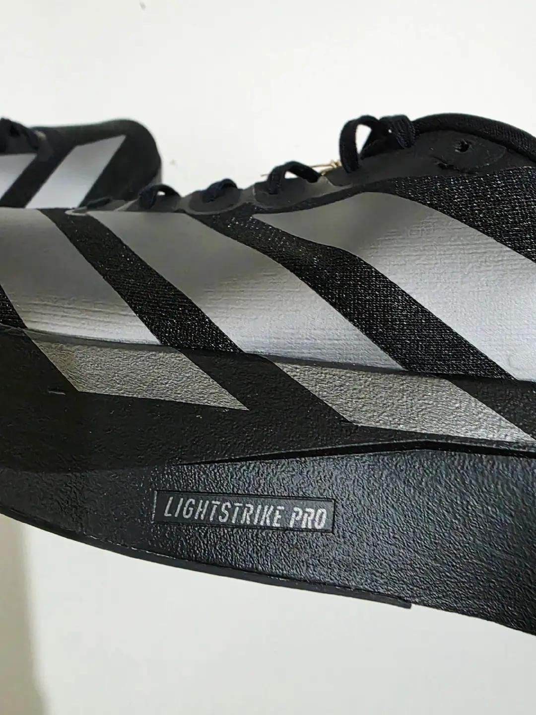 Customer photo review of Adizero Evo SL CoreBlack / Iron Mettalic