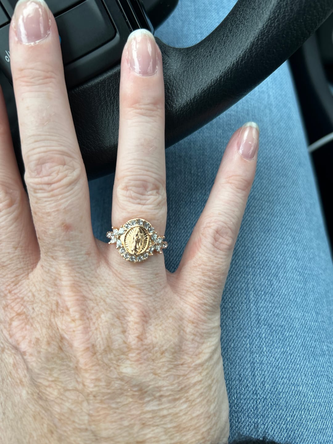 Customer photo review of Christianartworkshop Elegant Virgin Mary Emblem Ring: Sacred Detail for Daily Devotion