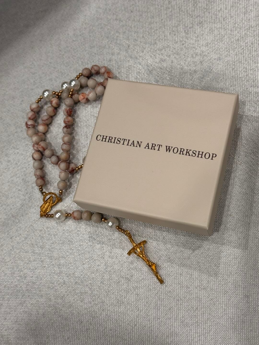 Customer photo review of CHRISTIAN ART WORKSHOP Matte Pink Zebra Jasper and Pearl Rosary with Miraculous Medal and Crucifix