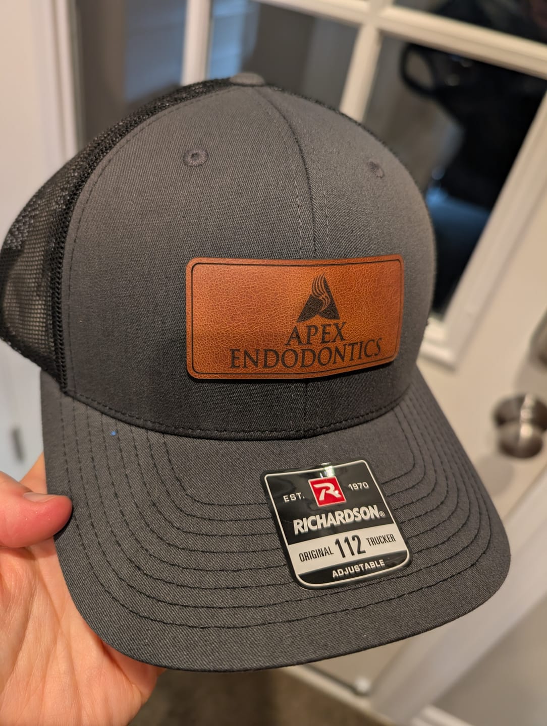 Customer photo review of Custom Leather Patch Trucker Hat - Richardson 112