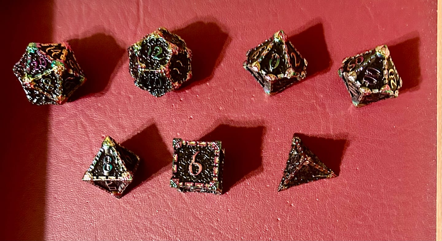 Customer photo review of Patrons Dark Orb - Metal Dagger Dice Set