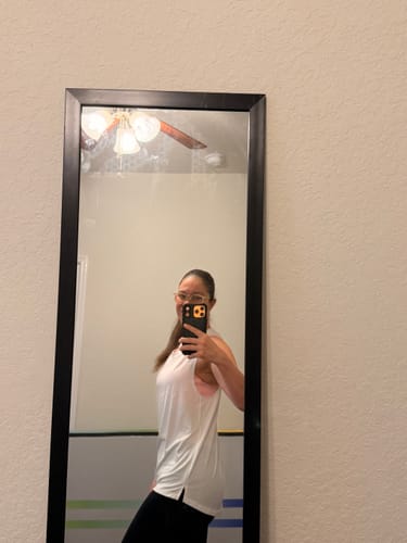 Customer photo review of Flowy Scoop Hem Muscle Tank