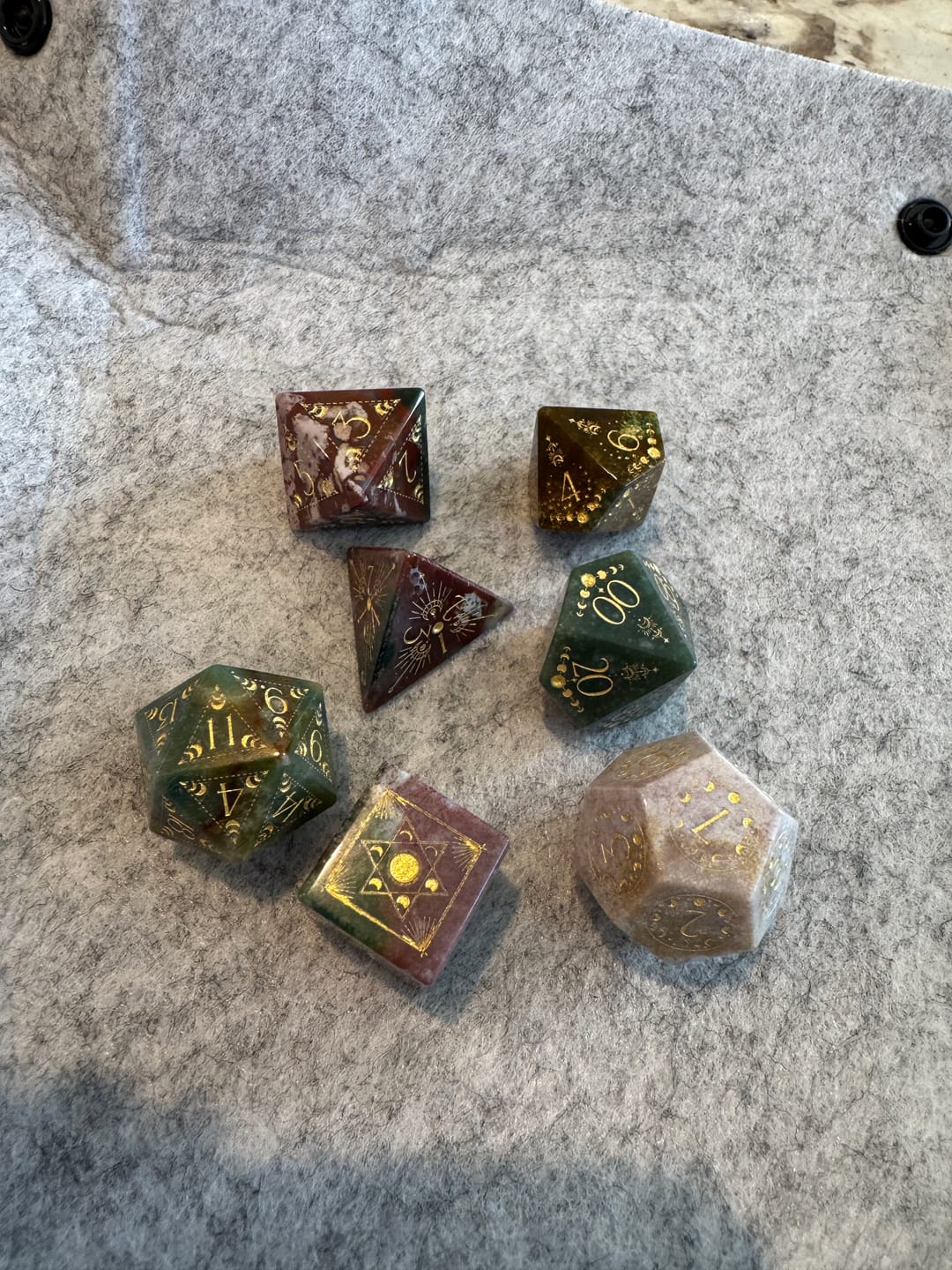 Customer photo review of URWizards D&D Indian Agate Engraved Dice Set Lunar Eclipse