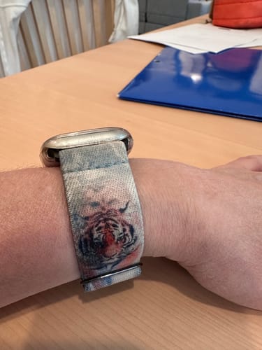 Customer wearing the Find Your Way Tiger Watch Band, with the strap doubled up to fit a small wrist.