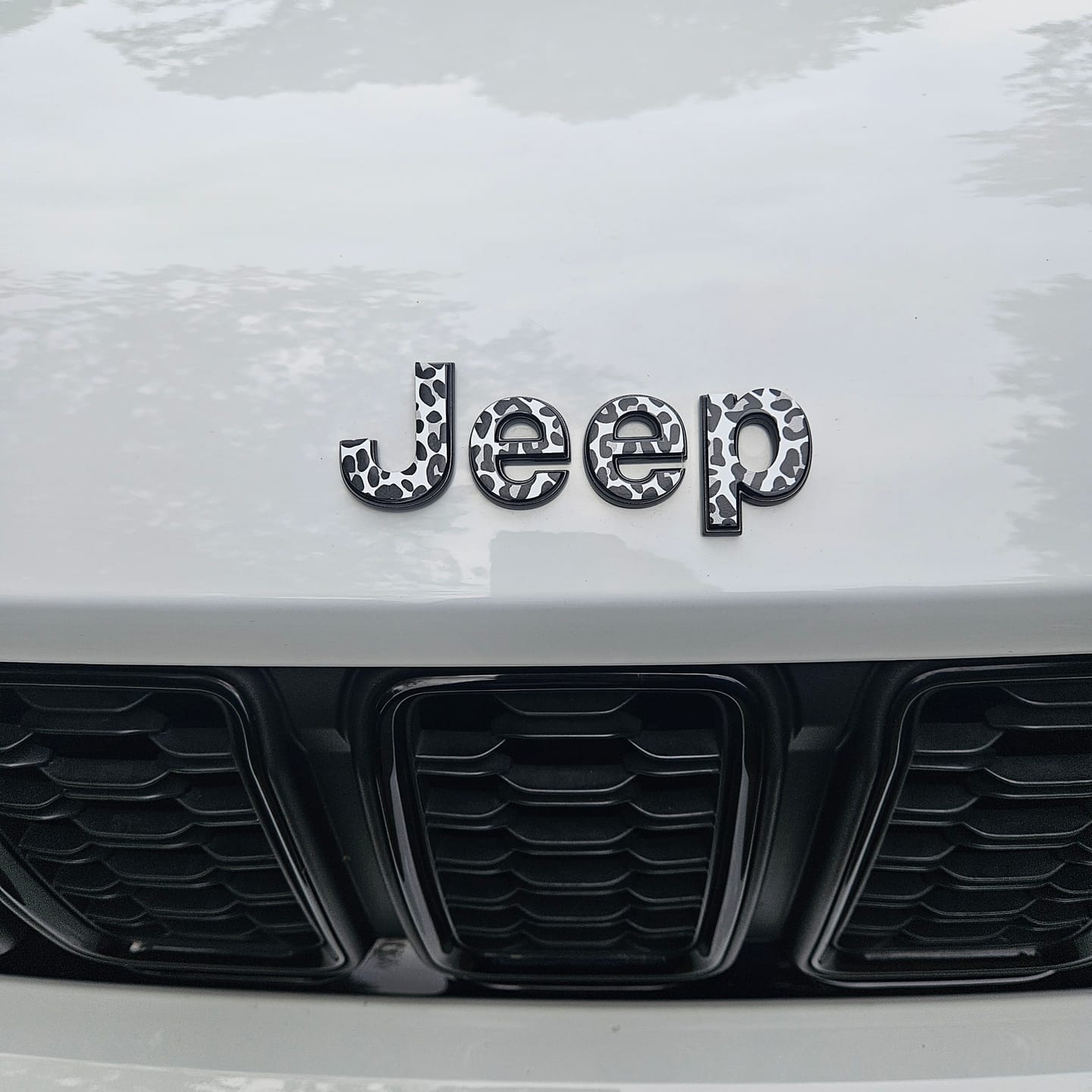 Customer photo review of Jeep Emblem Overlay Decals – Animal Print Designs | Fits Grand Cherokee, Cherokee, Compass, Renegade, Liberty, Patriot