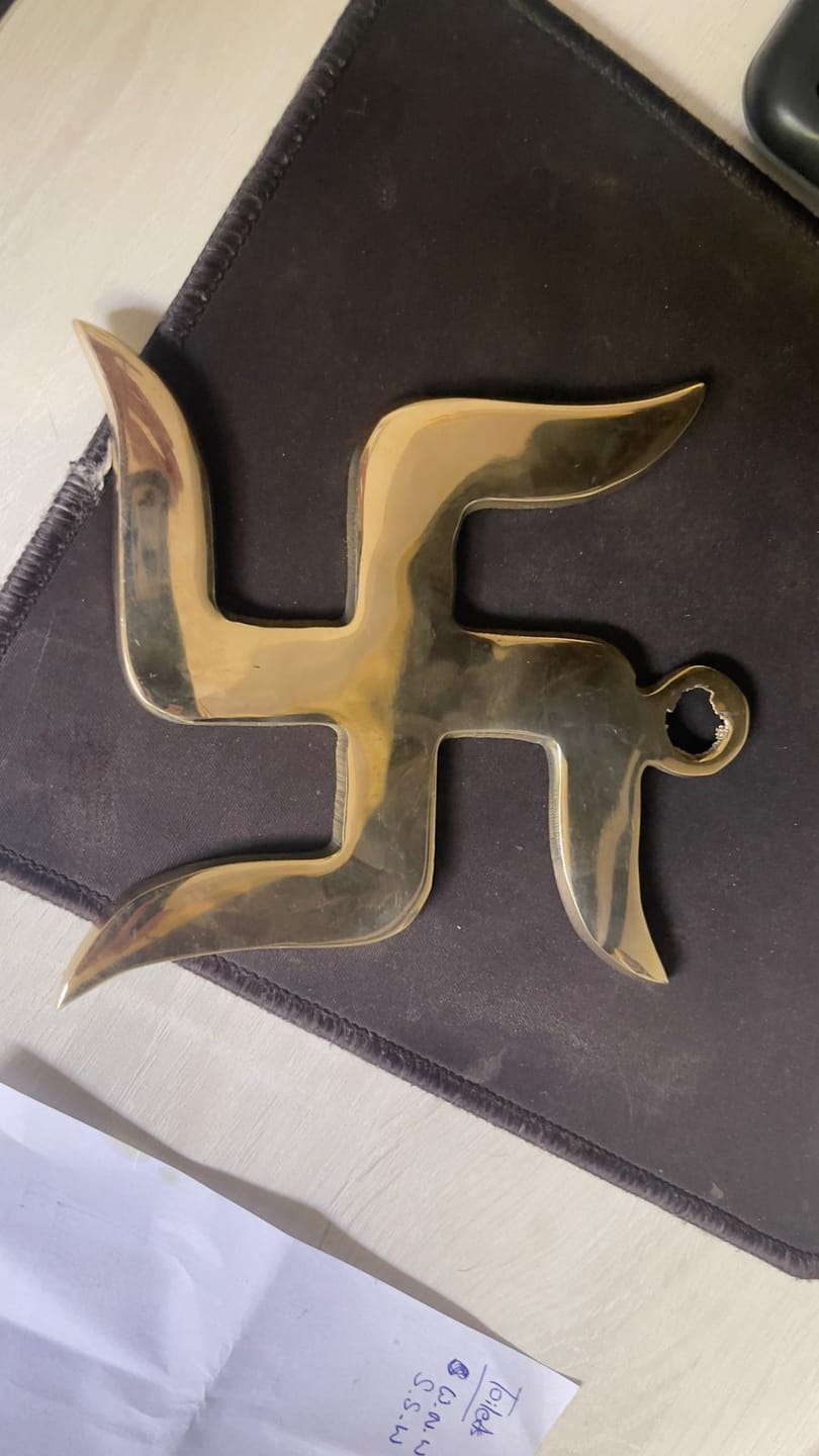 Customer photo review of Brass Swastik – Vastu Remedy for Home Protection | Main Door Dosh Nivaran | 6 & 9 Inch