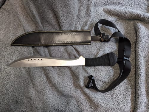 Customer photo review of 24" Book of Eli Bushcraft & Camping Machete with Custom Blade Material Variations