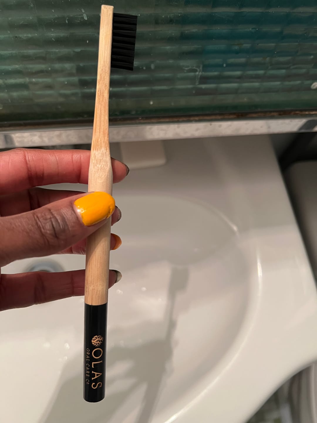 Customer photo review of OLAS Toothbrush Charcoal - Black Handle