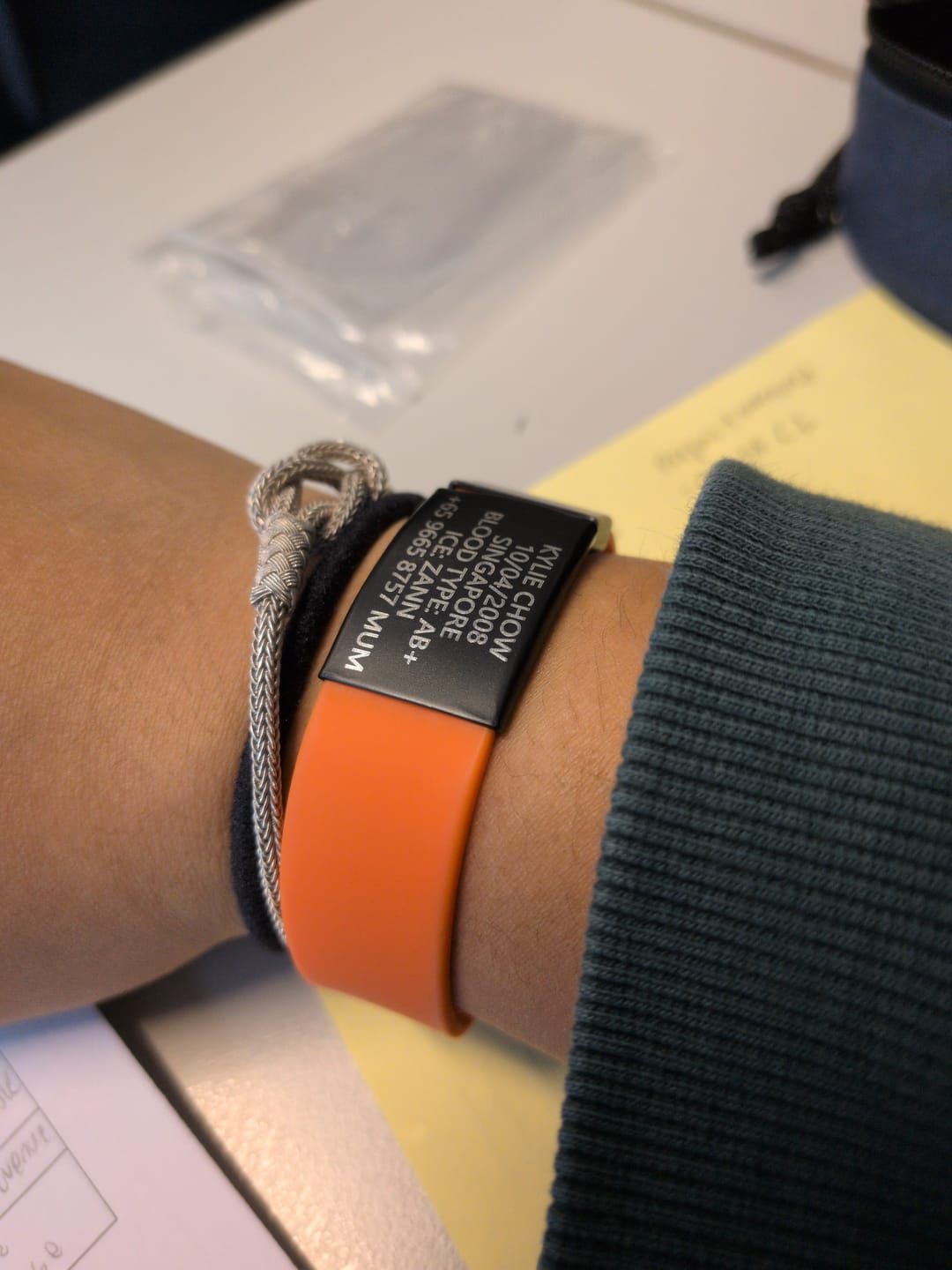 Customer photo review of Nola Orange Silicone Sports Medical Alert Bracelet