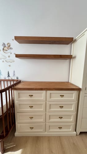 Foto de Catalina S.: Cómoda de madera 9 cajones y mudador para bebes