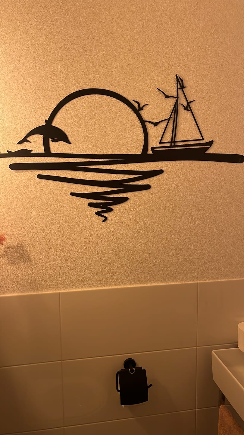 Customer photo review of Décoration murale en métal - Lever du soleil (SUN.02)